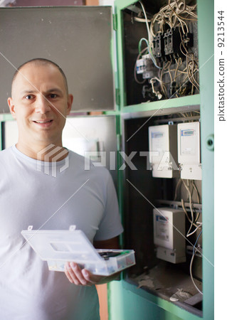 Man working with electric Man working with electric 9213544