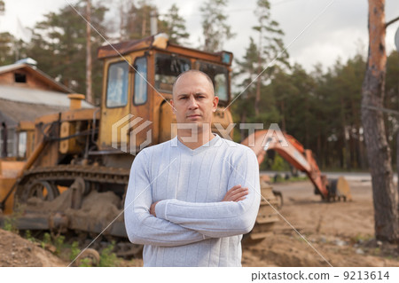 Portrait of tractor operator 9213614