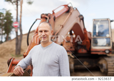 Portrait of tractor operator Portrait of tractor operator 9213637