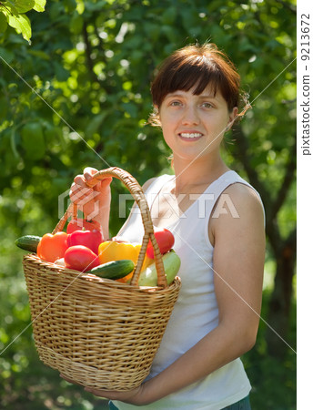 Happy woman with vegetables Happy woman with vegetables 9213672