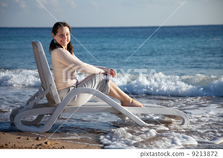 Happy mature woman on sea beach Happy mature woman on sea beach 9213872
