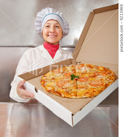 female cook with pizza female cook with pizza 9213969