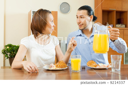 adult couple having breakfast adult couple having breakfast 9214337