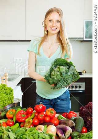 beautiful woman with vegetables and greens beautiful woman with vegetables and greens 9214419