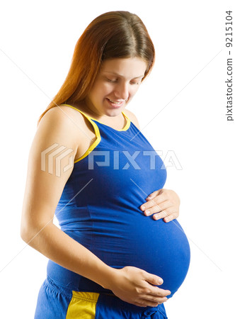 pregnant woman holding her tummy 9215104