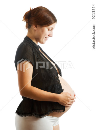 pregnant woman in black shirt over white 9215234