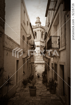 Retro photo of old picturesque street 9216716