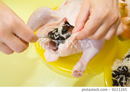Closeup of stuffing chicken Closeup of stuffing chicken 9221265