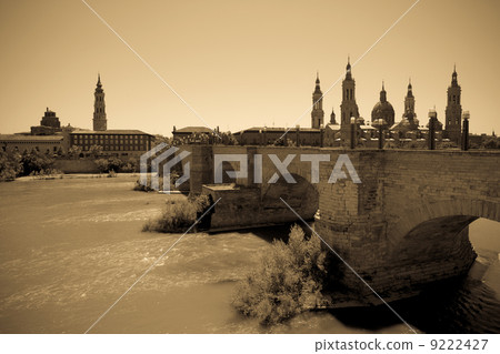 stone bridge and Cathedral in Zaragoza. Imitation of vintage im stone bridge and Cathedral in Zaragoza. Imitation of vintage im 9222427