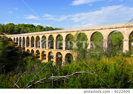 ancient roman aqueduct in summer forest. Tarragona, ancient roman aqueduct in summer forest. Tarragona, 9222600