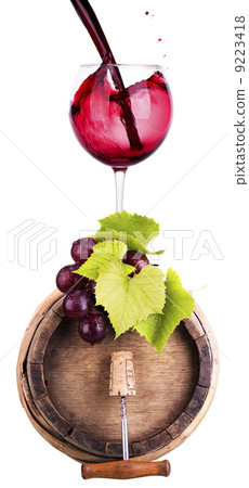 grapes on a barrel with corkscrew and wine glass grapes on a barrel with corkscrew and wine glass 9223418
