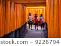 School Girls walking through the Torii Gates in Fushimi Inari Taisha 9226794