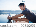 Young Asian Man Stretching Before Exercise 9230255