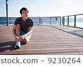 Young Asian Man Tying Running Shoelaces 9230264