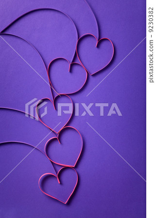 paper flowers with hearts on purple background 9230382