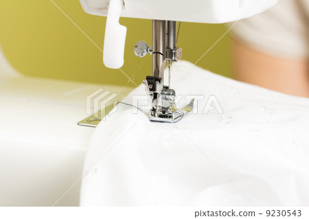 using a sewing machine 9230543