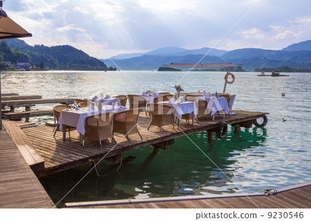Luxurious restaurant with tables on pier 9230546