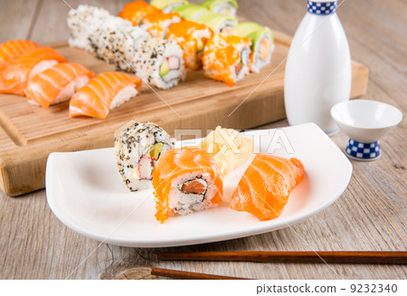 Variation of fresh tasty sushi rolls 9232340