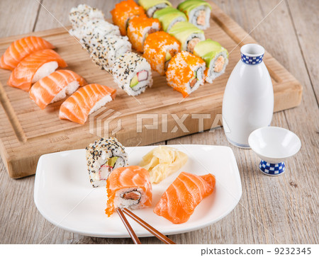 Variation of fresh tasty sushi rolls 9232345