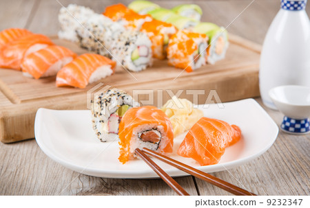 Variation of fresh tasty sushi rolls 9232347
