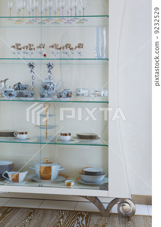 cabinet with beautiful dishes 9232529