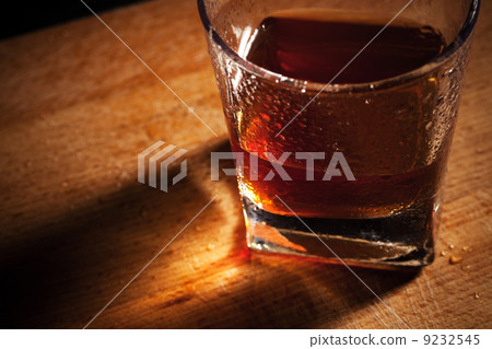 whisky on a wooden table 9232545