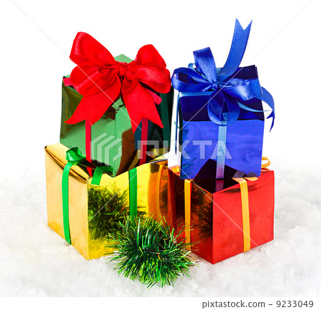 Christmas presents up on snow background 9233049