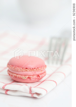 Pink Macaron in close up isolated on white background Pink Macaron in close up isolated on white background 9236908