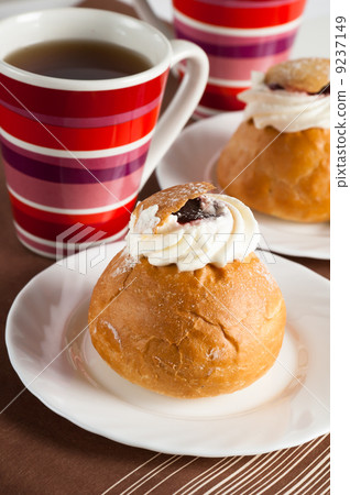 Rich rolls with a cream, a close up Rich rolls with a cream, a close up 9237149