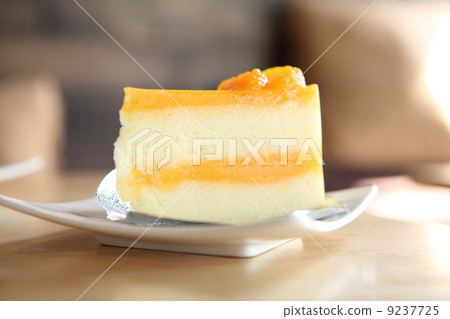 Orange cake on wood background 9237725