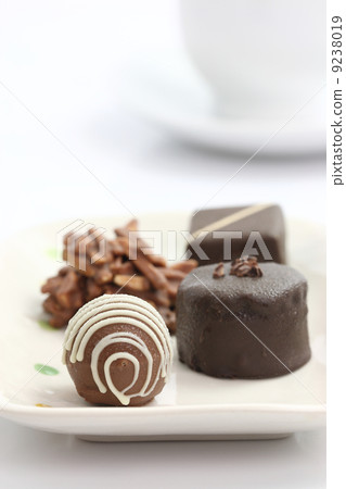 Chocolated with coffee cup isolated in white background 9238019