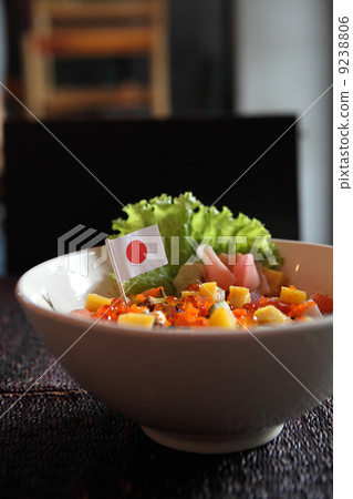 Sushi don , raw salmon tuna octopus on rice 9238806