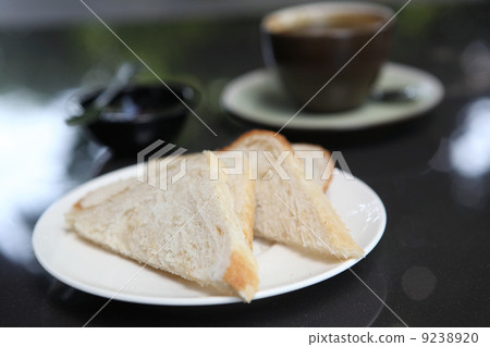 slice of bread with coffee 9238920