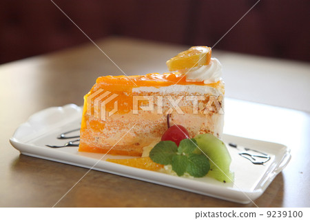 Orange cake on wood background 9239100