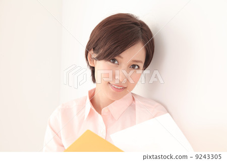 A woman with a document A woman with a document 9243305
