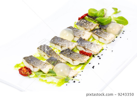 baked black cod fish on a white background in the restaurant 9243350