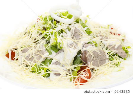 salad vegetables and goat cheese on a white background 9243385