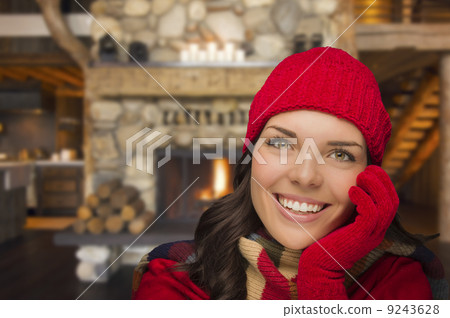 Mixed Race Girl Enjoying Warm Fireplace In Rustic Cabin Mixed Race Girl Enjoying Warm Fireplace In Rustic Cabin 9243628