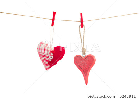 two hanging red hearts on white two hanging red hearts on white 9243911