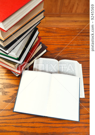 open books on wooden table open books on wooden table 9245569