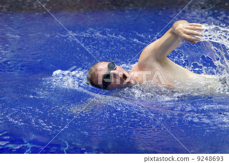 The young sports swimmer in pool The young sports swimmer in pool 9248693