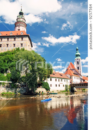 Old city in Cesky Krumlov. Vltava and castle with church 9257564