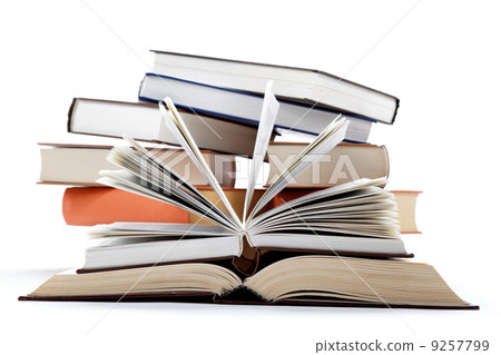 A stack of books on a white background. A stack of books on a white background. 9257799
