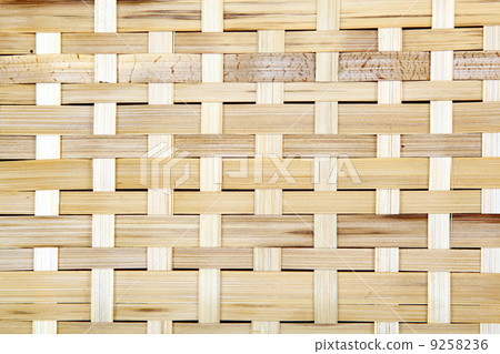 Wooden grid, the background of woven wood. Bamboo wood texture. 9258236