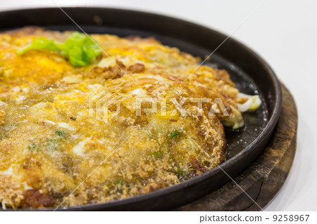 Fried oysters with egg and flour on hot plate 9258967