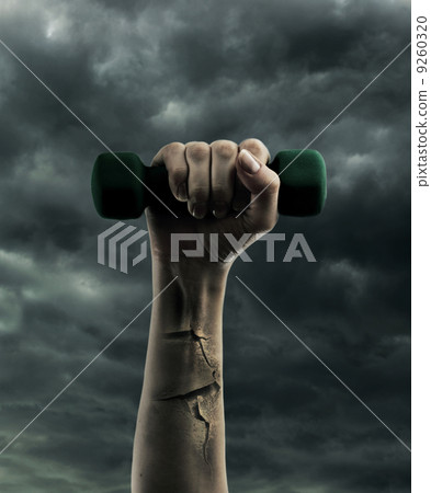 Dumbbell in hand 9260320