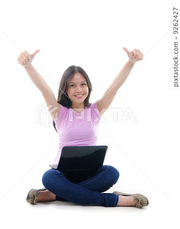 Asian student thumbs up with great smile, empty book ready for t 9262427