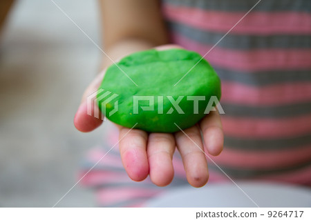 Colorful play dough on hand Colorful play dough on hand 9264717