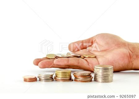 Stack of coins in hand 9265097