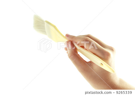 woman hand with a brush isolated 9265339